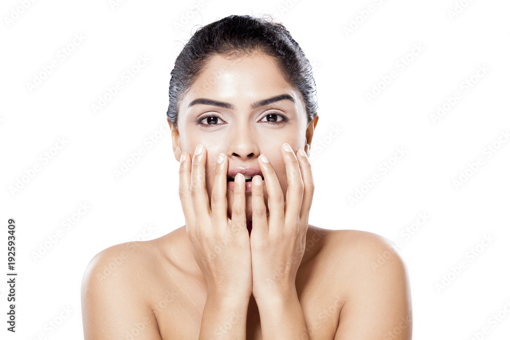 Beautiful Indian woman isolated over white background Beautiful Indian woman isolated over white background