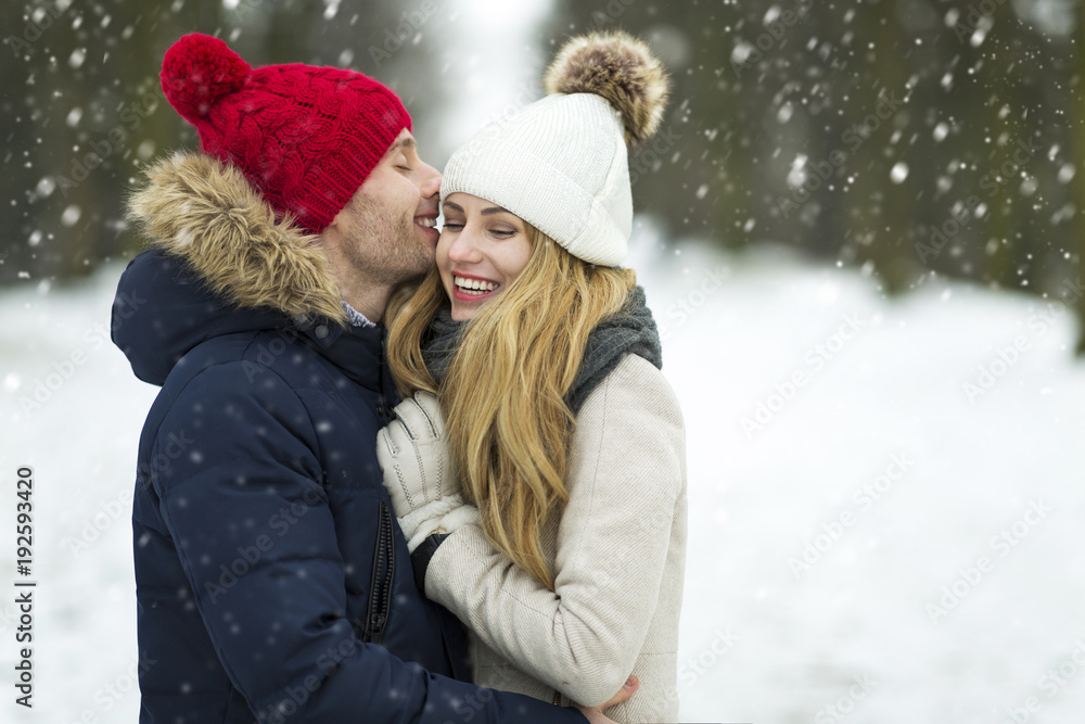 Couple in love in winter scenery
Couple in love in winter scenery