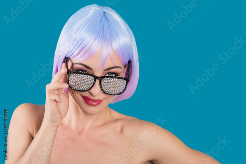 Flirting woman in glamour glasses
