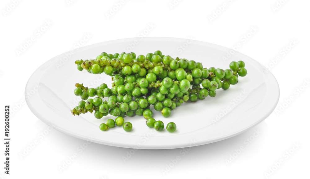 green pepper corn in plate on white background green pepper corn in plate on white background