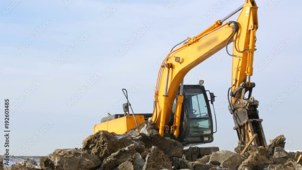 Hydrohammer machine working at building site Hydrohammer machine working at building site