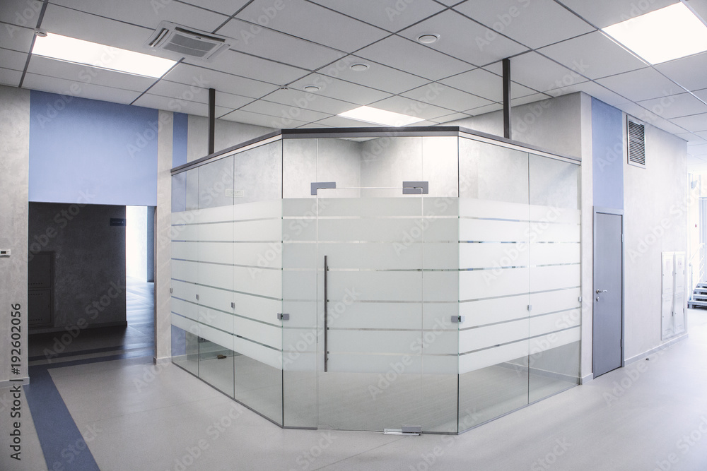 Modern office interior. Glass partition Modern office interior. Glass partition