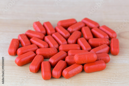 Red film coated tablets of Multi Vitamins and Minerals, anti stress formula photo