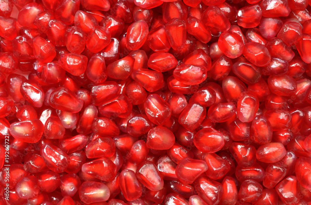 Isolated pomegranate seeds, top view closeup image of scattered pomegranate seeds isolated on white background, red seeds of pomegranate after peeled, tropical fruit healthy food, red fruit grain Isolated pomegranate seeds, top view closeup image of scattered pomegranate seeds isolated on white background, red seeds of pomegranate after peeled, tropical fruit healthy food, red fruit grain