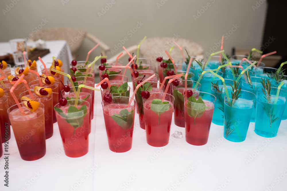 Drinks, colorful cocktails on the party. Set of alcohol cocktails with fruits. Beverages Drinks, colorful cocktails on the party. Set of alcohol cocktails with fruits. Beverages