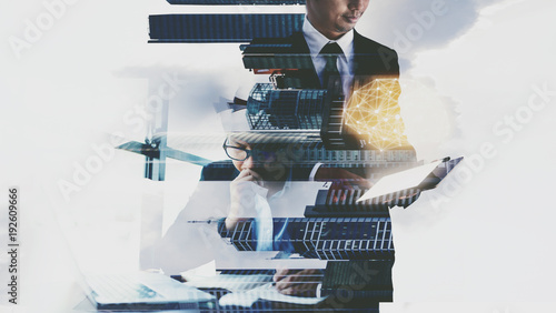 Foto Double exposure of a businessman working .