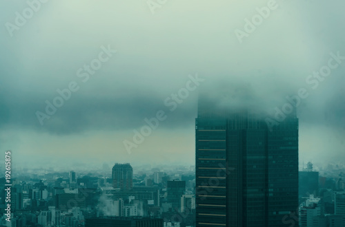 Photography Storm passing over skyscrapers in Tokyo, Japan