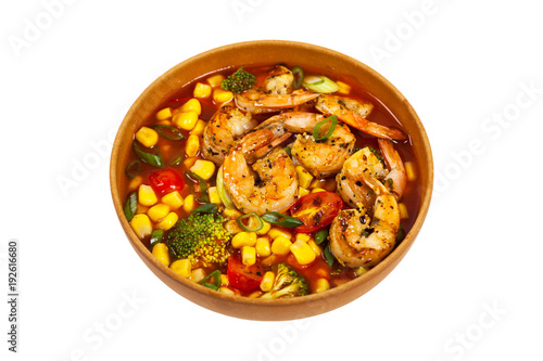 Shrimp Soup With Tomato, Broccoli and Corn Isolated on White background. Selective focus.