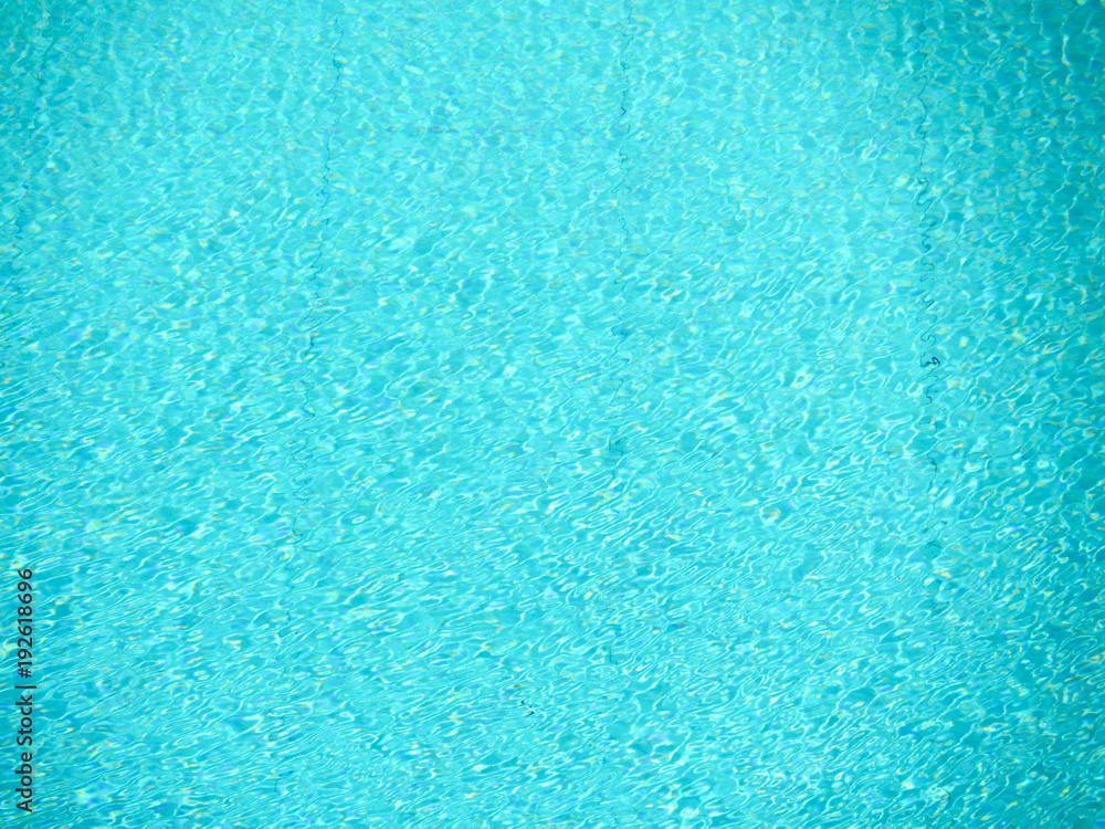 swimming pool water surface has little wave by wind