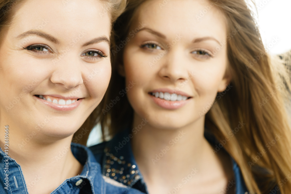 Two happy women friends having fun