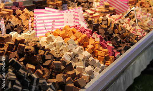 Valokuva A Display of Freshly Made Fudge on a Market Stall.
