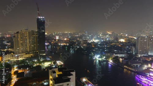 Bangkok Thailand cityscape, ship transportation, vehicle traffic at night, time lapse