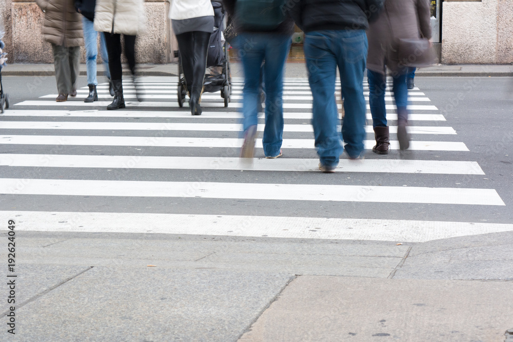 Horizontal View of People Walking and Crossing the Street. Horizontal View of People Walking and Crossing the Street.