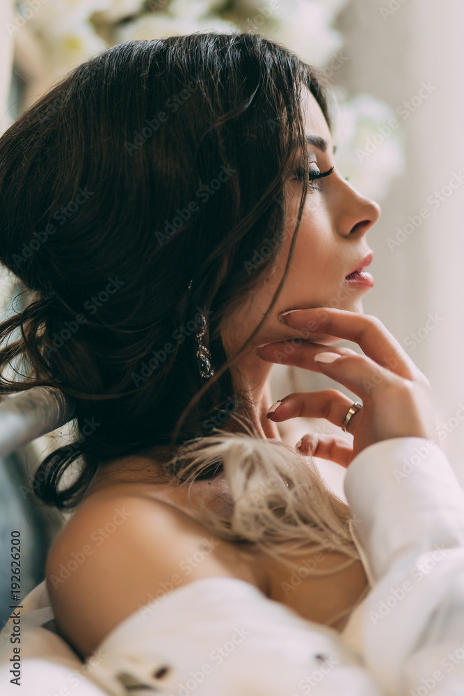 Φωτογραφία Beautiful bride in lingerie and big white male shirt in bedroom on bed, Boudoir morning of the bride