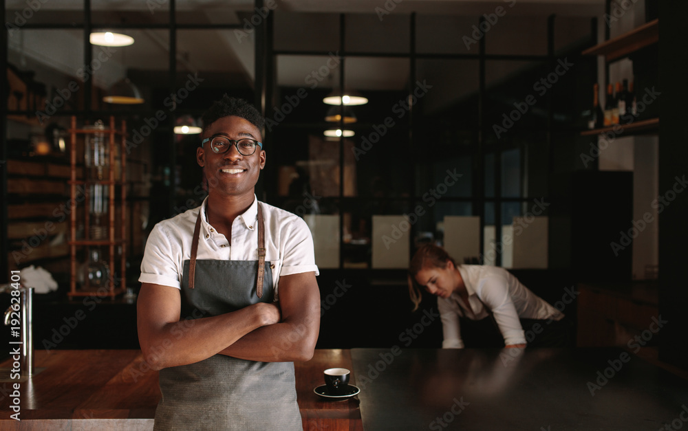 Business owner couple at their coffee shop Business owner couple at their coffee shop