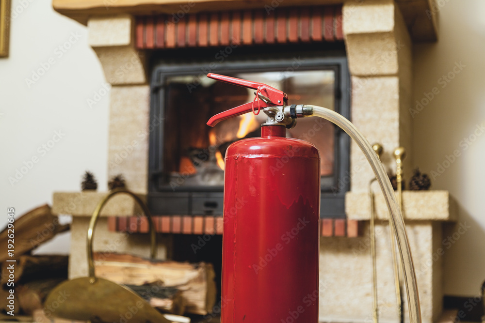 fire extinguisher is in front of fireplace fire extinguisher is in front of fireplace