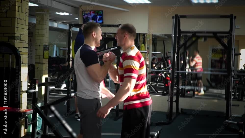 two athletes enjoy success in the gym two athletes enjoy success in the gym