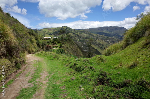 A mountain track winds through the Ecuadorian Andes on the Quilotoa Loop hike