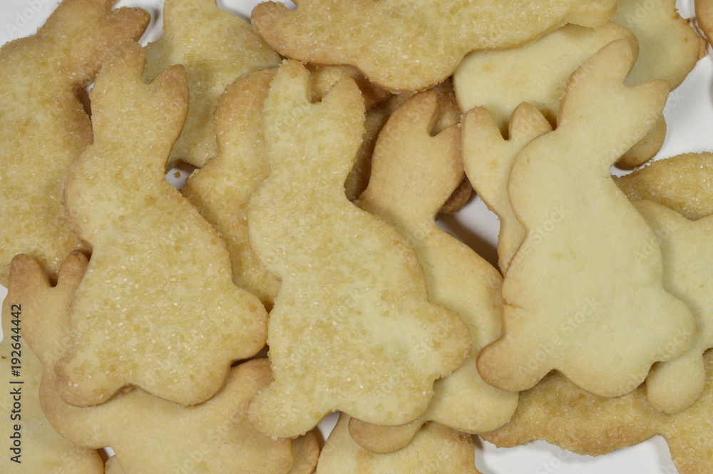 Homemade butter cookies in shape of bunnies with spring decorations Homemade butter cookies in shape of bunnies with spring decorations