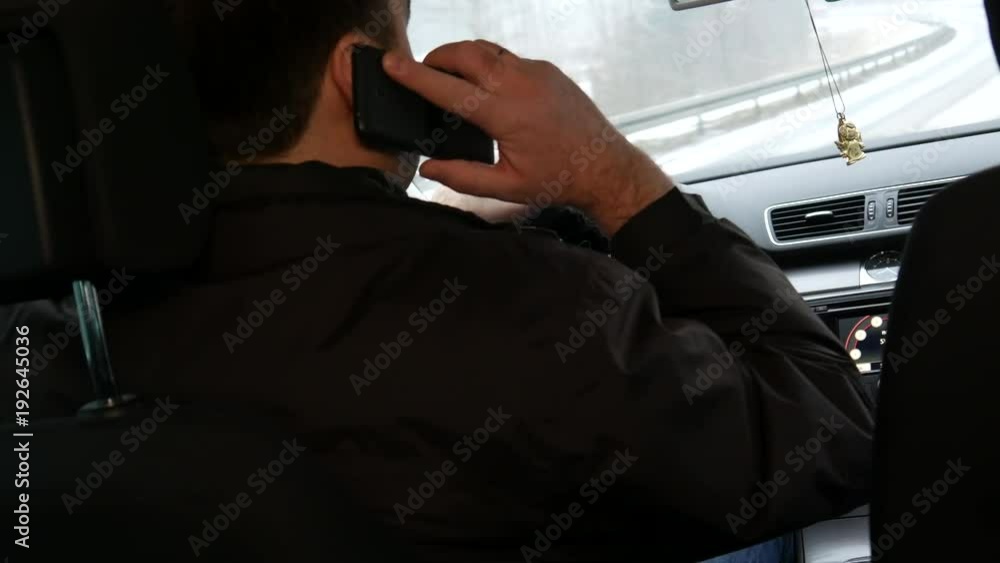 The driver is talking on the phone The driver is talking on the phone