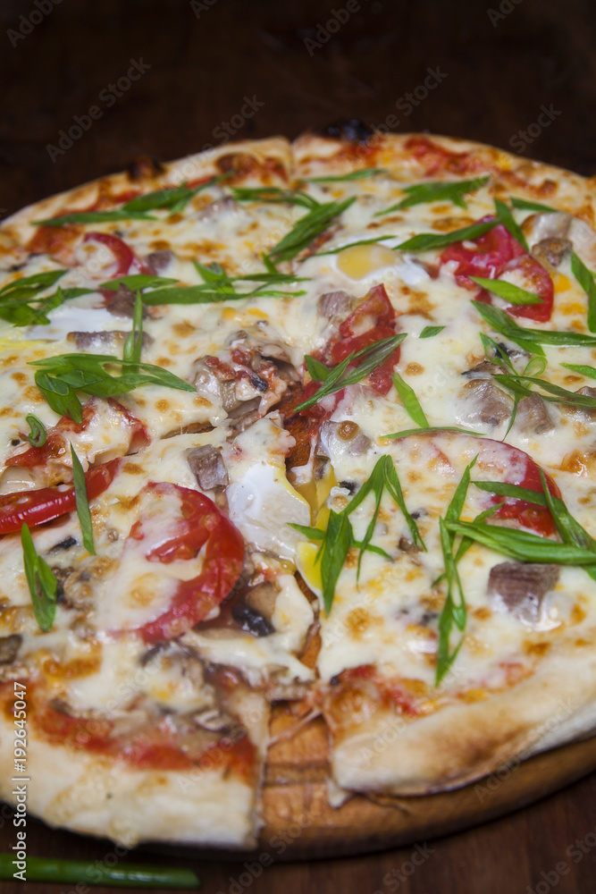 Pizza with eggplant cheese and green onion