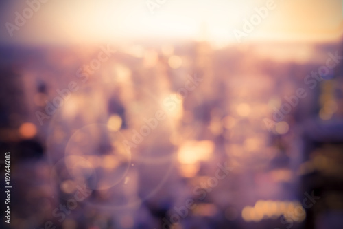 Photography Defocused blur of buildings across New York City with sunflare effect