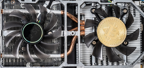 gold coin crypto currency bitcoin on a video card