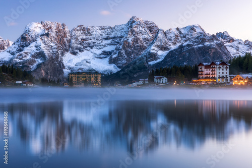 Misurina Lake  on Dolomites  Italian Alps  seen at sunrise. Sorapiss mountain in the background. South Tyrol  Dolomites  Italy.