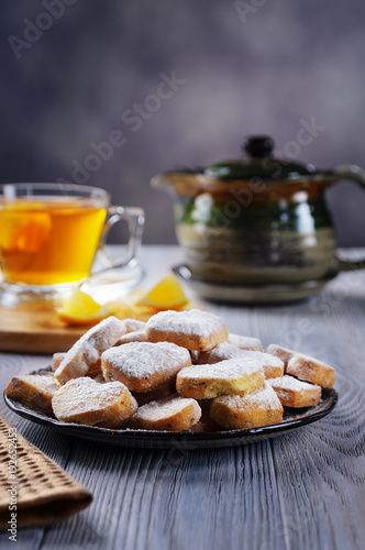 Tea with lemon and sweet biscuits © Tereza