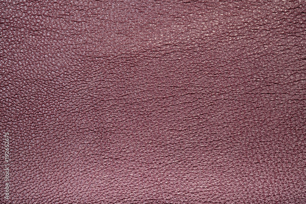 Fototapeta premium Seamless exture of a surface from a natural skin of red color. Close-up view.