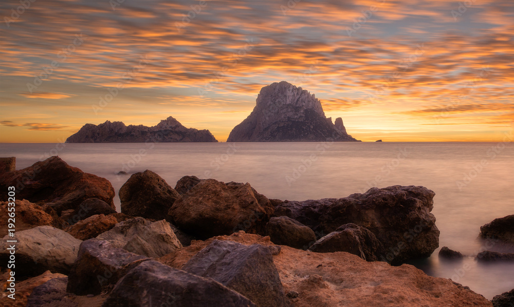 Sunset in Ibiza next to the island of Es vedra