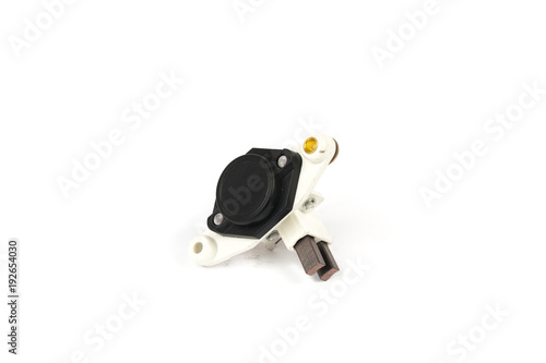 New car relay voltage regulator. charging generator on a white background