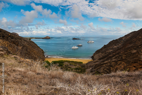 Some boats in the bay seen from the top of Punta Pitt photo