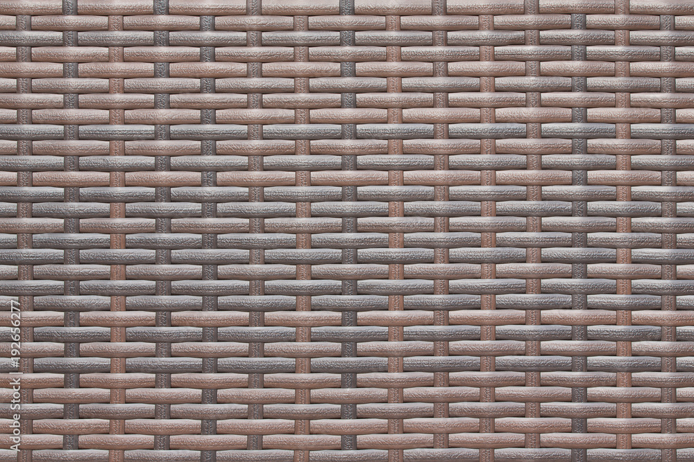 Rattan texture background. Brown rattan wallpaper. Plastic rattan close up. Rattan texture background. Brown rattan wallpaper. Plastic rattan close up.