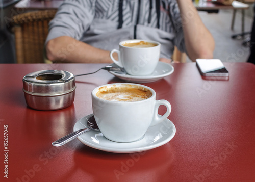 cup of coffee on a table in a cafe close-up