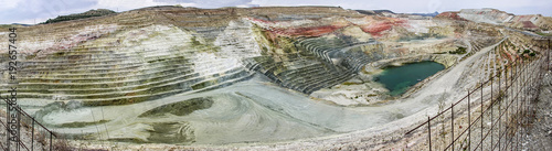 A panorama or a panoramic view of calcium bentonite quarry, located in the area of a bentonite processing plant in Greece. photo