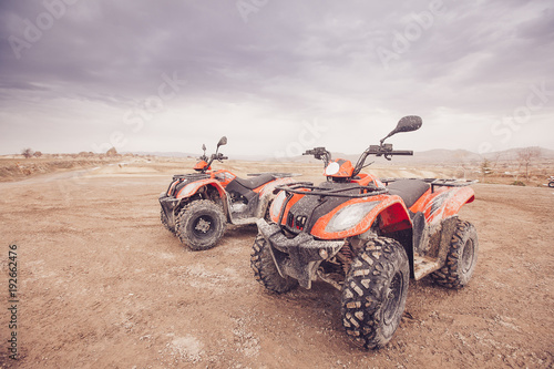 ATV Quad Bike in front of mountains landscape