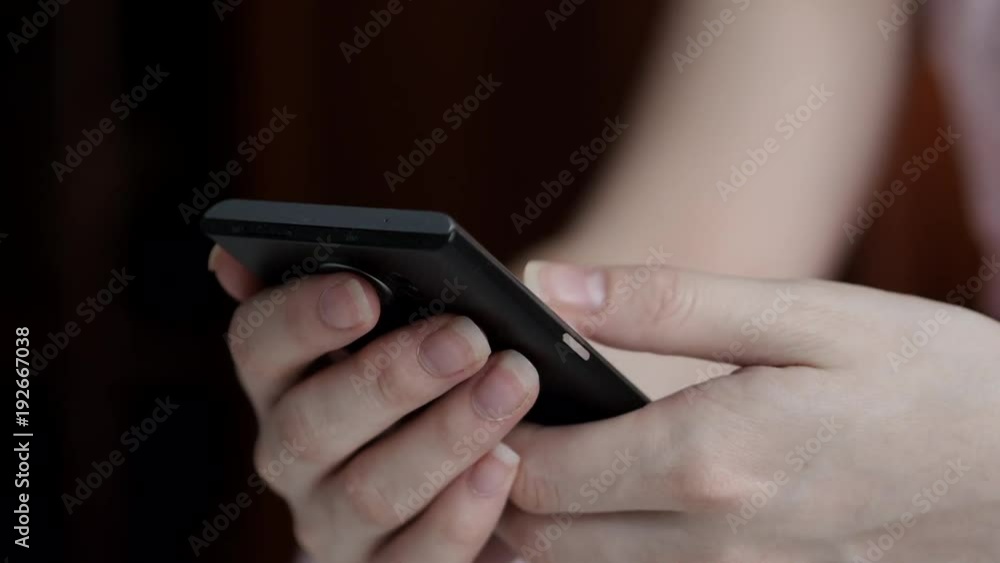Woman Hand Holding And Using Mobile Phone Woman Hand Holding And Using Mobile Phone