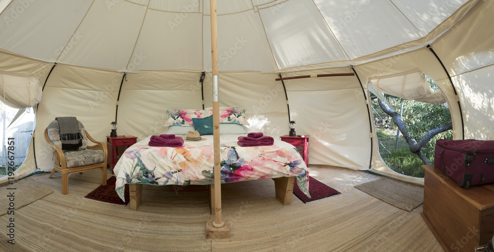 Glamping at Waiheke Island New Zealand. Tent with bed. Panorama ...