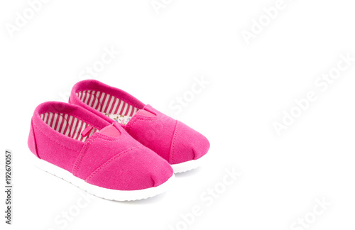 Pair of Pink Children's Shoes on a White Background