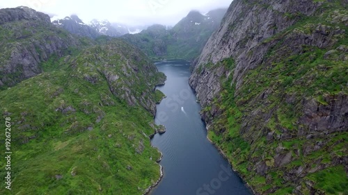 Fly above Trollfjord, Norway (aerial footage )  The amazingly narrow Trollfjord is a 2 km long sidearm of the Raftsund 