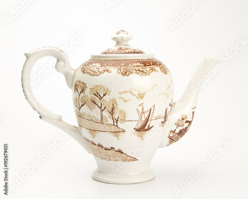 Antique teapot isolated on white background