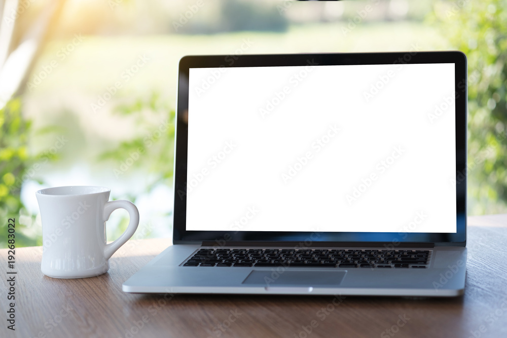 Laptop with blank screen on table. Workspace background new project on laptop computer with blank copy space screen for your advertising text message Laptop with blank screen on table. Workspace background new project on laptop computer with blank copy space screen for your advertising text message
