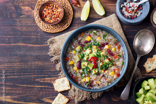 Vegetable quinoa soup stew with avocado corn beans
