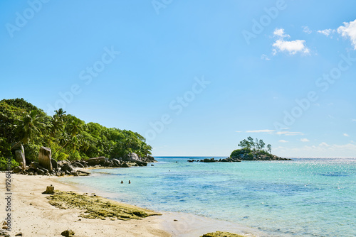 Fototapeta Naklejka Na Ścianę i Meble -  Little granite Mouse island (Ile Souris), Anse Royal beach, island of Mahe, Seychelles, Indian Ocean
