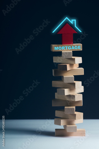 Mortgage concept wooden puzzle