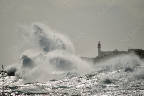 Strong waves and lighthouse in background, Taliarte, coast of Telde, Canary islands © ptoscano