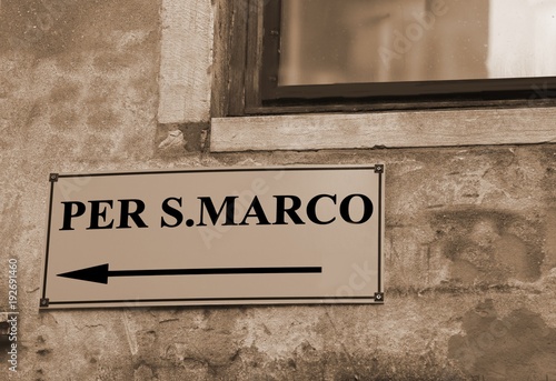 directions to go to Sqaure of Sanint Mark in Venice in Italy with sepia toned photo