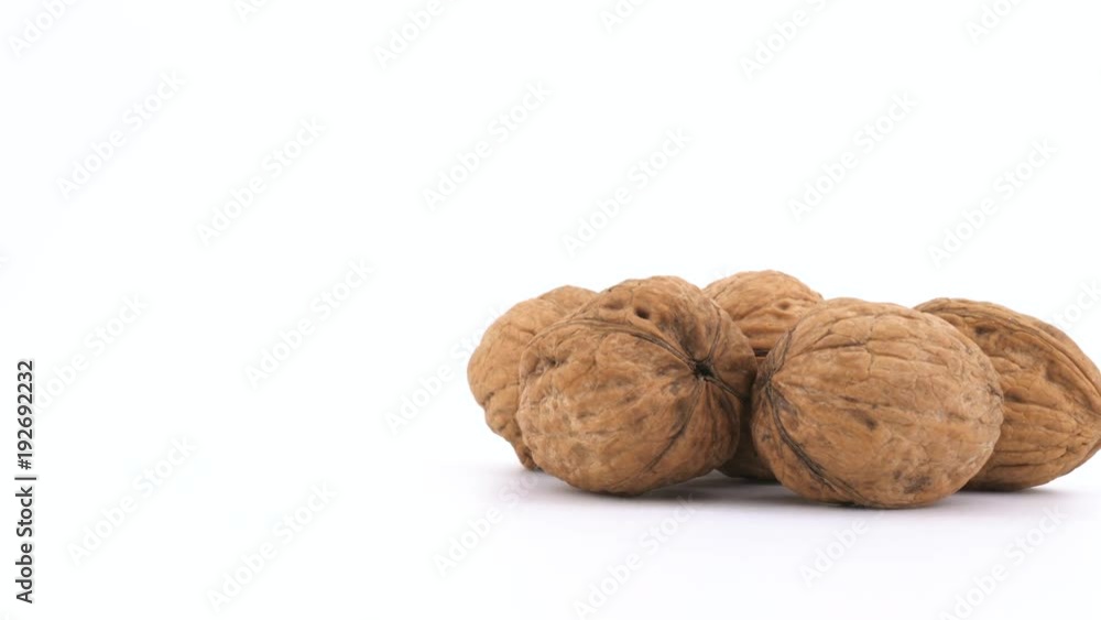 Walnuts isolated rotating on white background (loopable). Copyspace Walnuts isolated rotating on white background (loopable). Copyspace