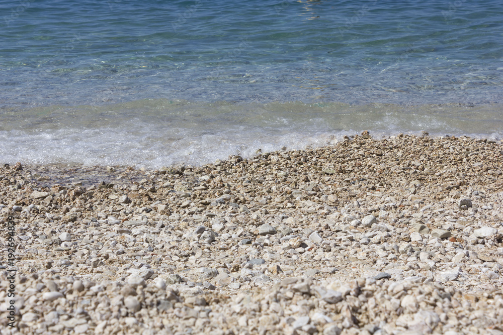 Stobrec beach with its white pebbles and crystalline beach Stobrec beach with its white pebbles and crystalline beach